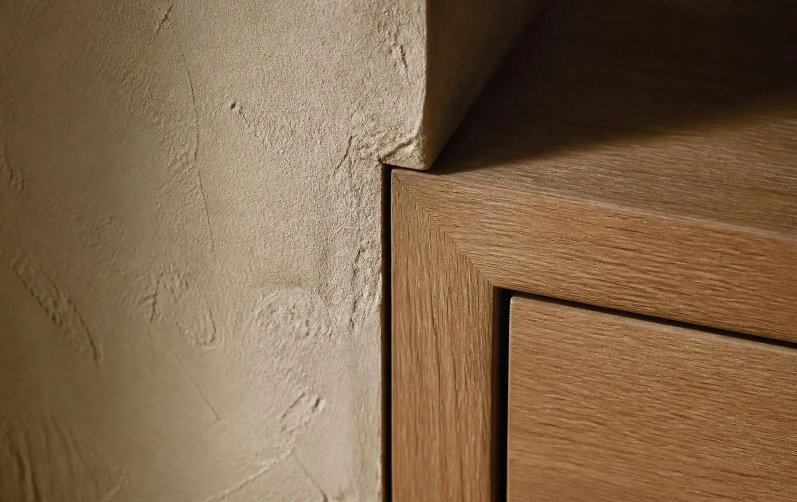 Plaster and oak architectural detail in soft daylight